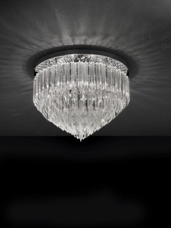 Plafoniera con piatto riflettente e vetri prismi quadriedri