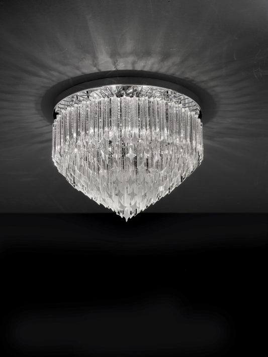 Plafoniera con piatto riflettente e vetri prismi quadriedri